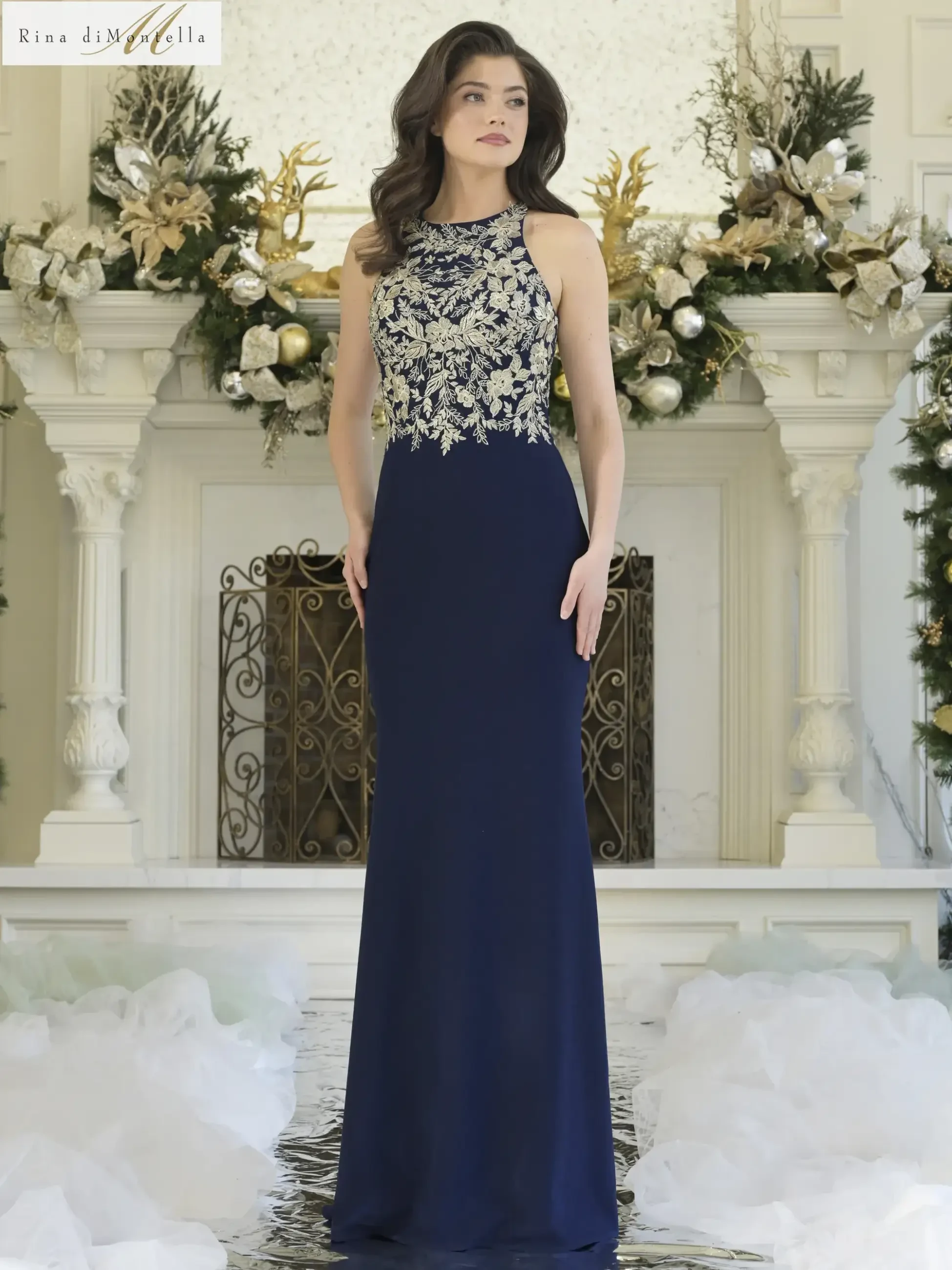 model is wearing a sleeveless blue mother of the bride gown